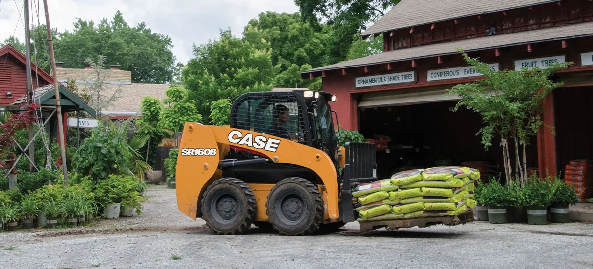 Case SR160B Skid Steer Loader with pallet forks attachment