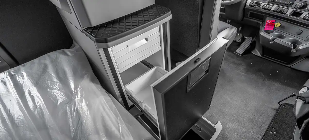 Kenworth T680 built-in drawer-style refrigerator in sleeper cab